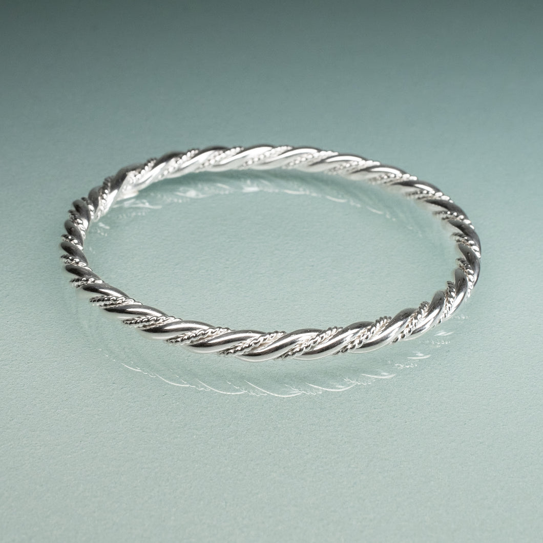 sterling silver twist rope bangle by hkm jewelry