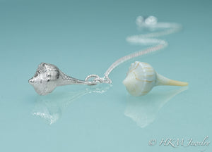 custom cast lightning whelk necklace in sterling silver from a clients favorite shell
