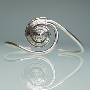 Whelk Wave cuff custom made by hkm jewelry in oxidized finish