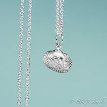Load image into Gallery viewer, front close up view of ark clam shell necklace in polished silver by hkm jewelry 
