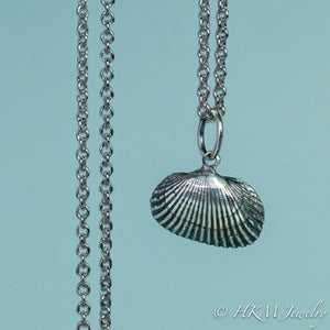 front close up view of ark clam shell necklace in oxidized silver by hkm jewelry 