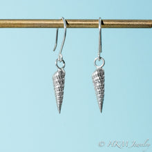 Load image into Gallery viewer, close up side and front view of auger snail shell dangle earrings in polished silver by hkm jewelry 
