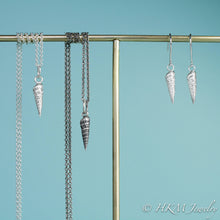 Load image into Gallery viewer, to scale view of auger snail shell dangle earrings and matching necklaces in polished and oxidized silver by hkm jewelry
