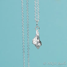 Load image into Gallery viewer, close up front view of baby knobbed whelk necklace in polished finish by hkm jewelry
