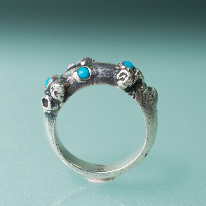 carved and cast sterling silver coral and barnacle ring with sleeping beauty turquoise cabochons by hkm jewelry