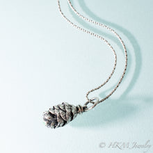 Load image into Gallery viewer, Cast Hemlock Cone Necklace with Emerald by HKM Jewelry
