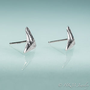 side view of post back on the bull shark teeth tiny stud earrings in sterling silver by hkm jewelry