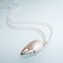 Load image into Gallery viewer, close up cast silver ghost crab claw in recycled silver on anchor chain by hkm jewelry
