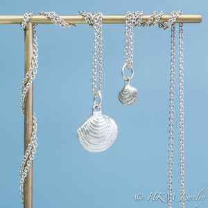 The Little Neck Clam Necklace is made from the molding and casting of a real "clam seed" in solid recycled silver by HKM Jewelry small and large