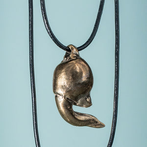 cast bronze oxidized lucky bone horseshoe crab claw necklace on leather cord by hali maclaren of hkm jewelry 