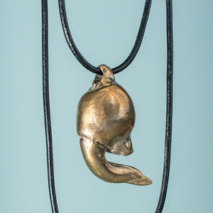 cast bronze polished lucky bone horseshoe crab claw necklace on leather cord by hali maclaren of hkm jewelry 