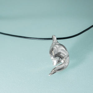 cast silver polished lucky bone horseshoe crab claw necklace on leather cord by hali maclaren of hkm jewelry 