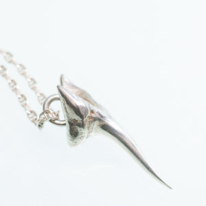 side view of cast silver mako shark tooth in recycled silver on anchor chain by hkm jewelry