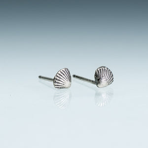 Side View of the cast silver mini clam shell stud earrings by Hali MacLaren of HKM Jewelry