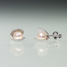 Load image into Gallery viewer, Side and Front view of the Mini scallop shell stud earrings cast in silver with freshwater pearls inside by Hali MacLaren of HKM Jewelry
