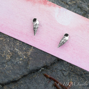 mini auger snail seashell stud earrings close up view in oxidized sterling silver by hkm jewelry