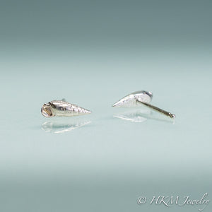 front and side view of auger snail studs by hkm jewelry in sterling silver