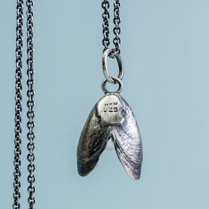 back view of mussel necklace in oxidized silver with pearl by hkm jewelry 
