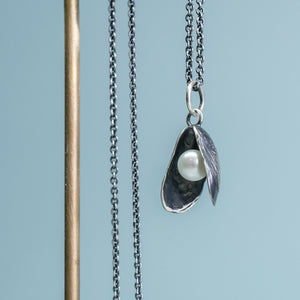 cast silver mussel necklace by hkmjewelry