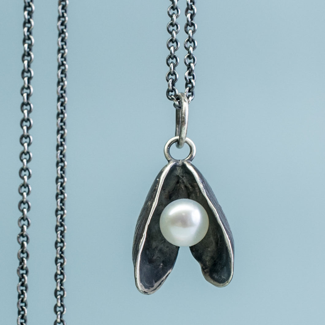 mussel shell necklace with freshwater pearl in oxidized silver by hkm