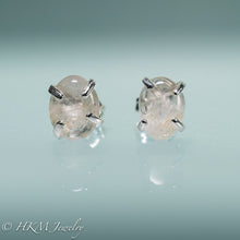 Load image into Gallery viewer, close up of medium size prong set tumble polished cape may diamond stud earrings in sterling by hkm jewelry
