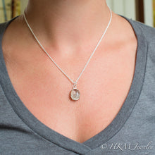 Load image into Gallery viewer, model wearing large prong set tumble polished cape may diamond necklace by HKM Jewelry
