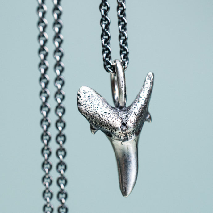 cast oxidized sterling silver fossilized sand tiger shark tooth on cable chain by hkm jewelry