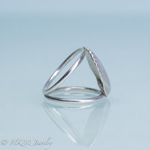 Load image into Gallery viewer, close up side view of large scallop shell ring on a split shank in sterling silver by hkm jewelry
