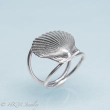 Load image into Gallery viewer, close up angled bottom view of large scallop shell ring on a double band in sterling silver by hkm jewelry
