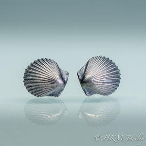 detail close up of small scallop shell stud earrings in oxidized sterling silver by hkm jewelry