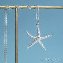 Load image into Gallery viewer, silver starfish necklace with diamond gemstone April birthstone by HKM Jewelry
