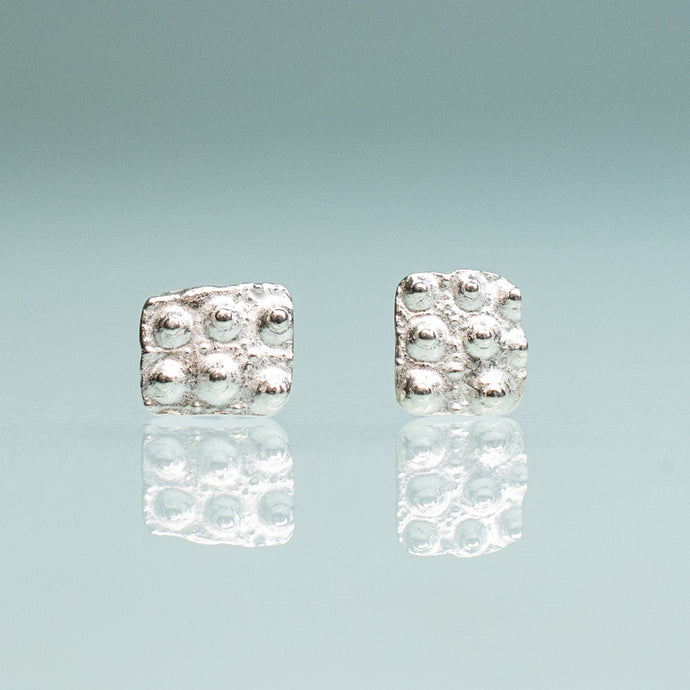 mini urchin square studs close up front view in sterling silver by hkm jewelry
