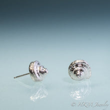 Load image into Gallery viewer, Side and Front view of the Channeled Whelk Top Studs in sterling silver by Hali MacLaren of HKM Jewelry on blue ombre background.
